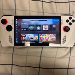 ASUS White Handheld Console with Red and Black Details